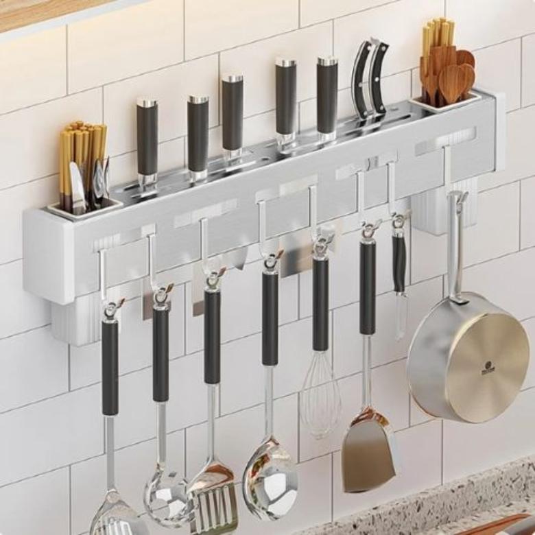 A kitchen holder rack for knives, cutlery, spoon and fork